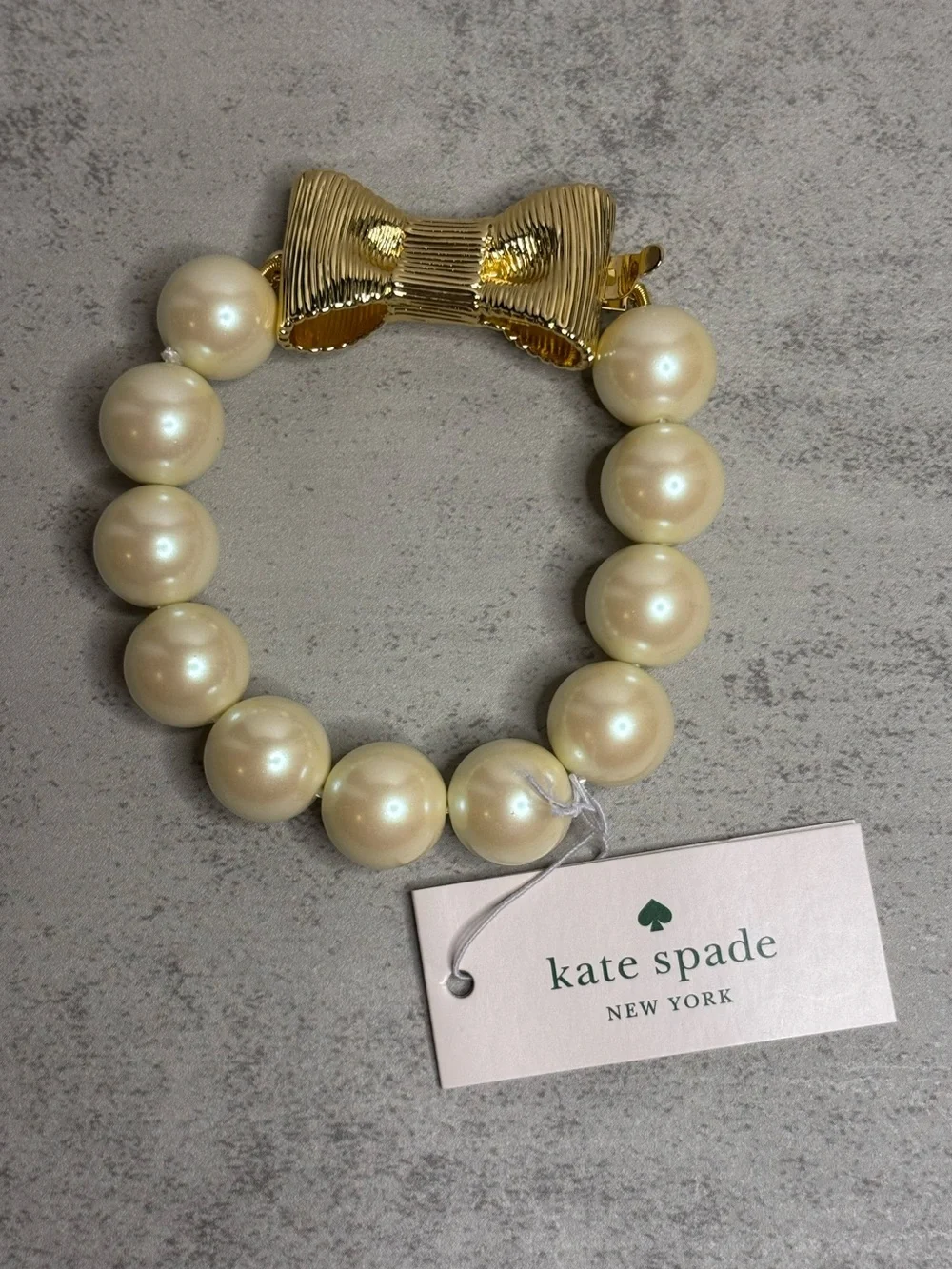 Kate Spade All Wrapped Up Faux Pearl Bracelet with Gold Bow Closure